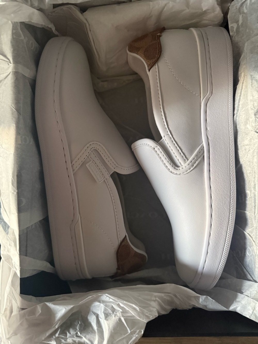 Coach White Slip-On Sneakers with Tan Heel Patch